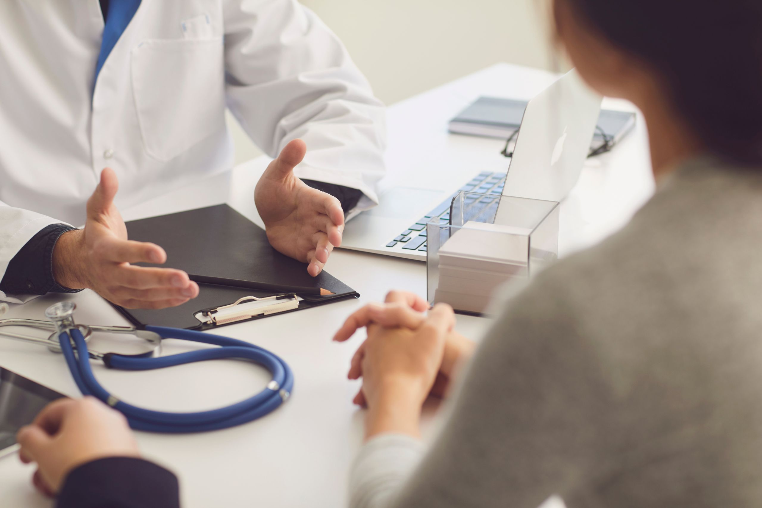 doctor sitting with patient going over what a 1013 form is in georgia