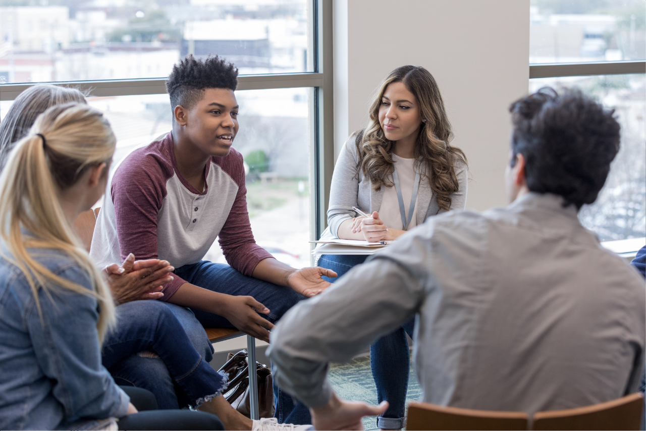 patients sitting in group therapy discussing are muscle relaxers addictive