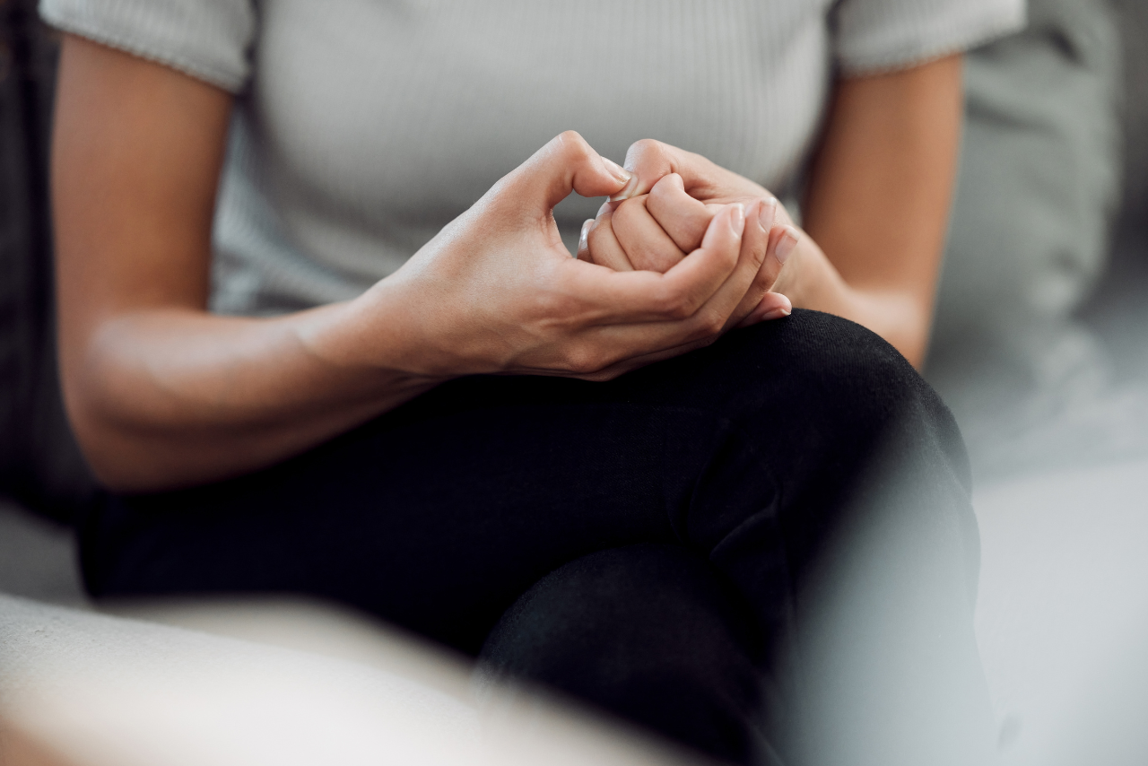 woman showing 7 signs of high-functioning anxiety