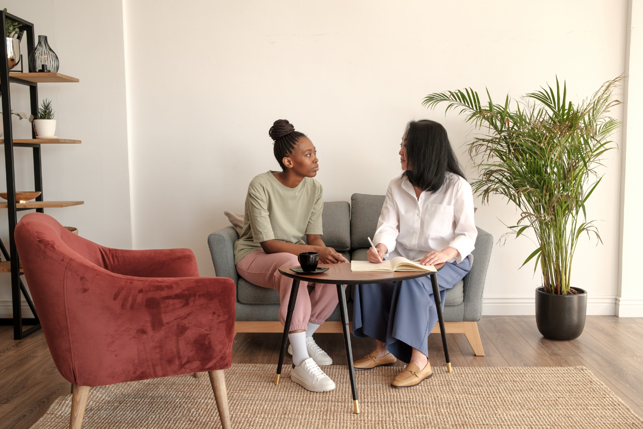 woman speaking with her therapist about is bipolar disorder genetic